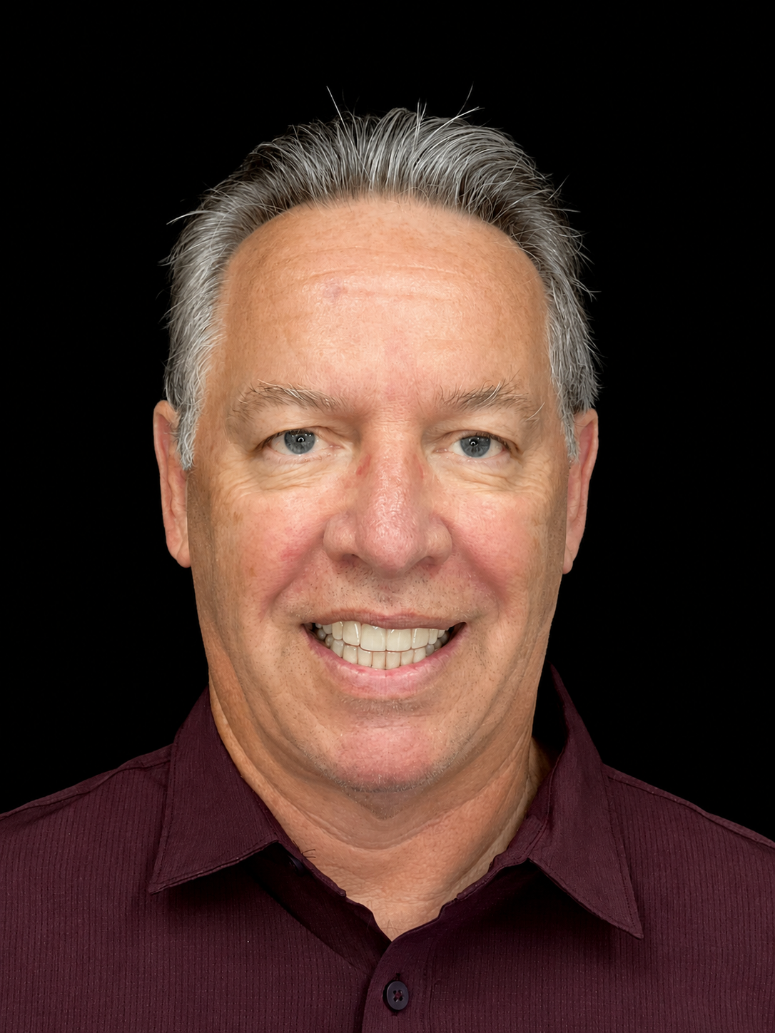 Steven smiling after Invisalign treatment
